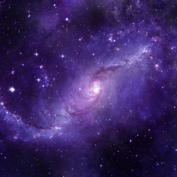 une galaxie violette pour illustrer poussière d'étoiles